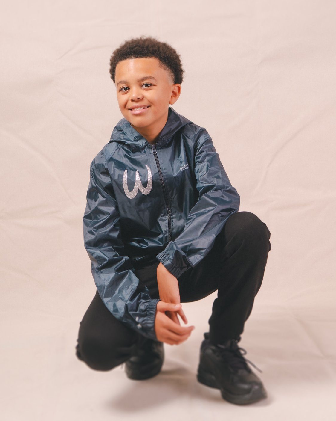 A Warriorz branded rain jacket